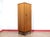 This Mid Century Modern Vintage Teak Single Armoire Wardrobe by White and Newton is a rare piece of furniture designed...
