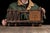 Antique handmade scale model of a railroad stock car constructed primarily of wood with metal and wire components. Modeled...