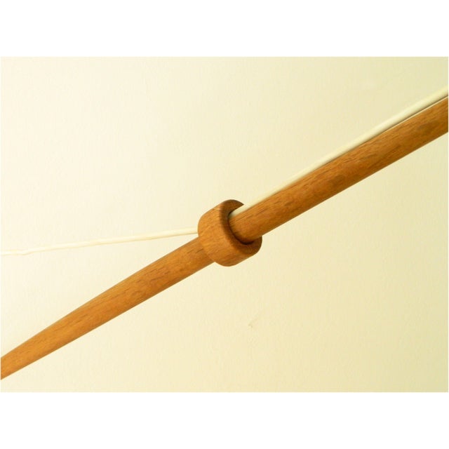 Teak wall lamp with original lampshade, designed by a. Bank jensen & kejld iversen for louis poulsen, denmark. A well-...