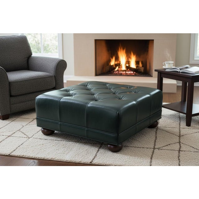 This versatile vintage leather ottoman effortlessly doubles as a coffee table, blending functionality with timeless...