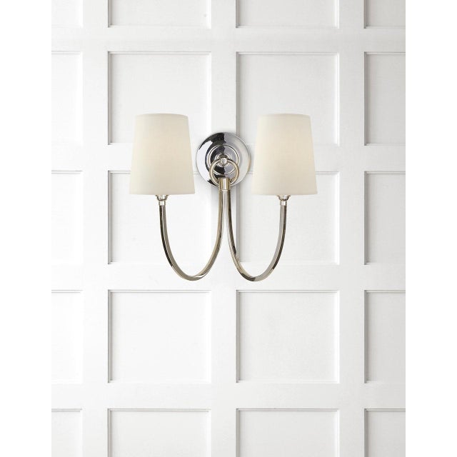 Reed Double Sconce in Polished Nickel with Linen Shades Designer: Thomas O'Brien Finish: Polished Nickel Height: 13"...