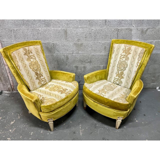 A Pair of Vintage Mid Century Modern / Hollywood Regency Upholstered Lounge Chairs Silver Craft. Circa 1960s Feature the...