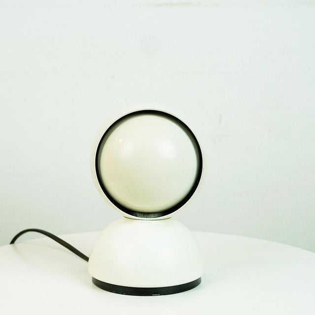 This iconic Italian Midcentury Modern white eclisse lamp was designed by Vico Magistretti in 1965 and is produced y...