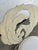Vintage Hollywood Regency Cast Aluminum Dining Chair with banana leaf motif. They have been painted cream color and boasts...