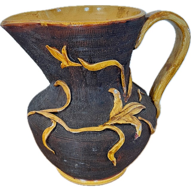 Wonderfully large Italian ceramic pitcher with applied leaves—attributed to Vietri (no visible markings)