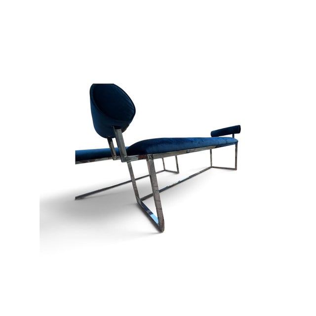 A striking pair of glamorous bolster benches featuring sumptuous cobalt blue velvet upholstery paired with sleek polished...