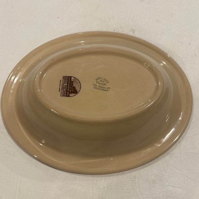 Wallace China Westward Ho Oval Serving Bowl 12" circa 1941-1964. It has the image of a cowboy roping a calf and signed by...