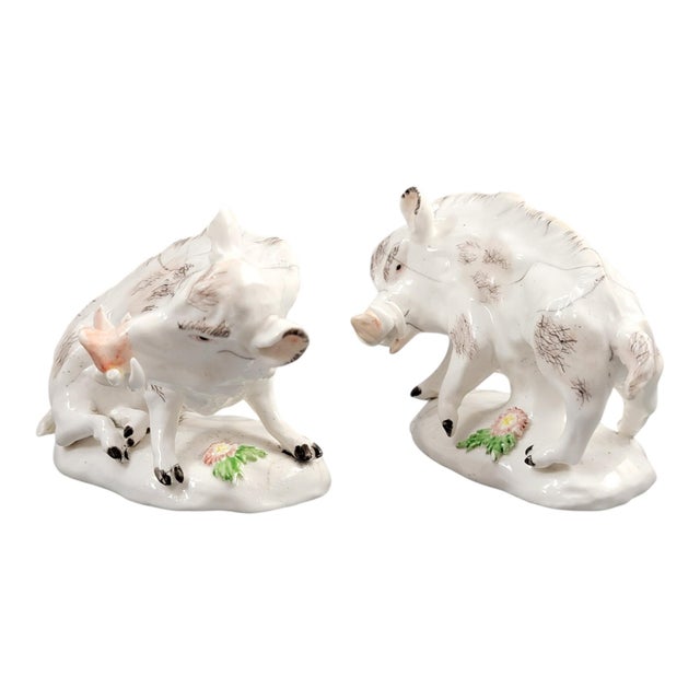 A rare pair of early Derby porcelain wild boars, c. 1755, recorded by Bradshaw as model B1 and recognised as one of the...