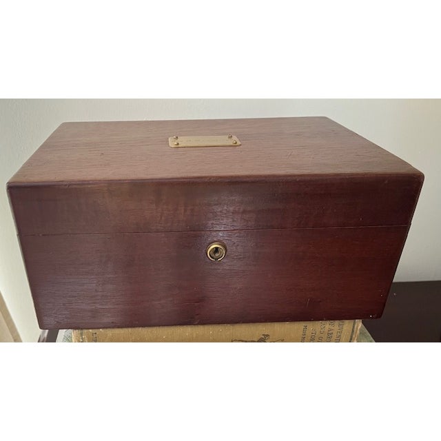 Vintage mahogany humidor/cigar box with engraved brass plaque on lid. The plaque is personalized Geo K Reynolds Jr. The...