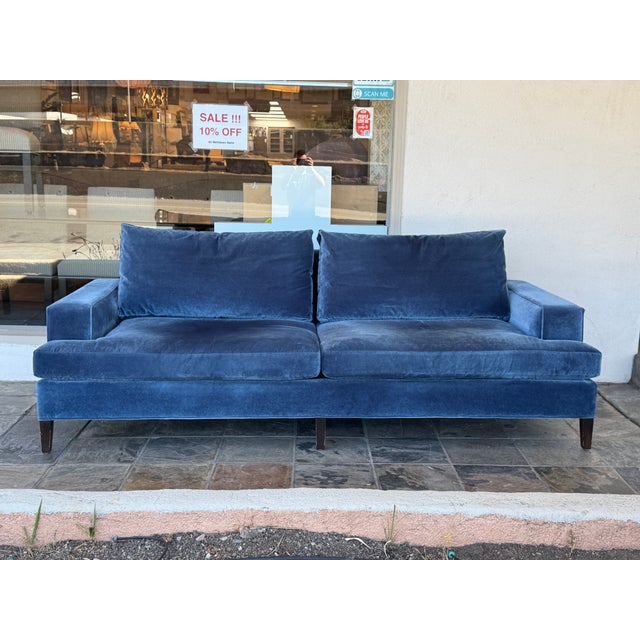 Design Plus Gallery presents a Tuxedo Sofa with Track Arms from Kravet. The table is built with an architectural boxy...