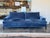 Design Plus Gallery presents a Tuxedo Sofa with Track Arms from Kravet. The table is built with an architectural boxy...