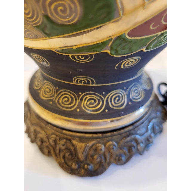 Beautiful antique Japanese Table lamp featuring the Immortals, pagoda and landscapes. Satsuma design dates from the Meiji...