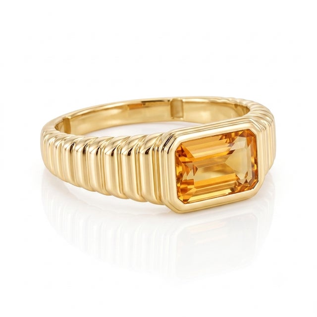 Embrace golden-hour warmth with this sunlit Citrine statement ring. Featuring a natural honey-gold Citrine set...