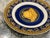 Elegant Rosenthal meets Versace Medusa Blue bread and butter plate featuring the iconic gold Medusa head against a rich...