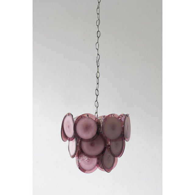 A stunning pendant lamp made by av mazzega, the legendary murano glassworks known for its artistic experimentation and...
