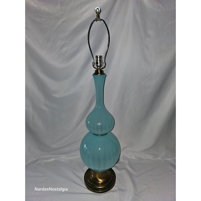 Every aspect of this lamp is original, from the base to the wiring and harp, making it a rare and authentic piece. This...