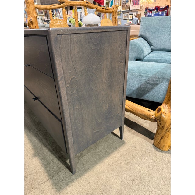 Elevate your interior with the refined sophistication of the Huppé “Edmond” Seven-Drawer Dresser—a masterclass in...