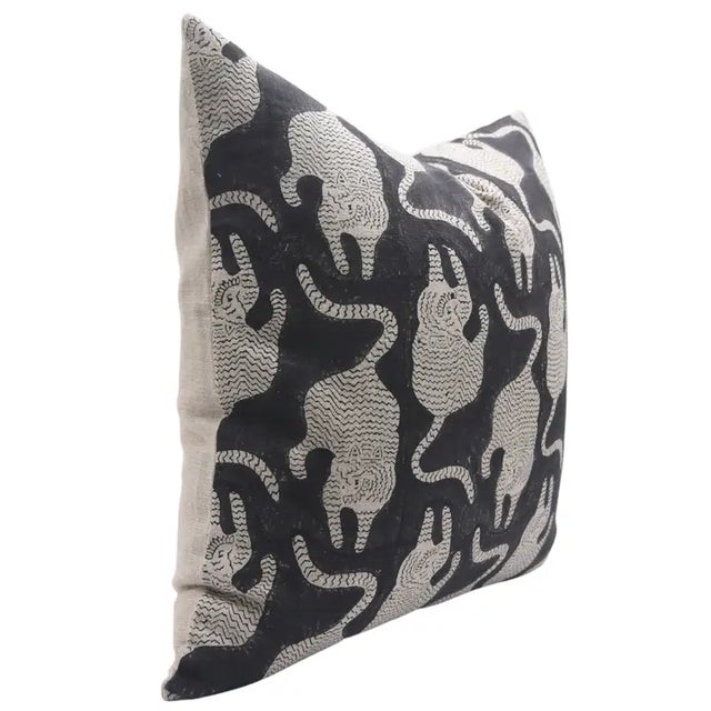 Add a touch of tradition and character to your home with this handmade block print cushion cover, featuring the charming...