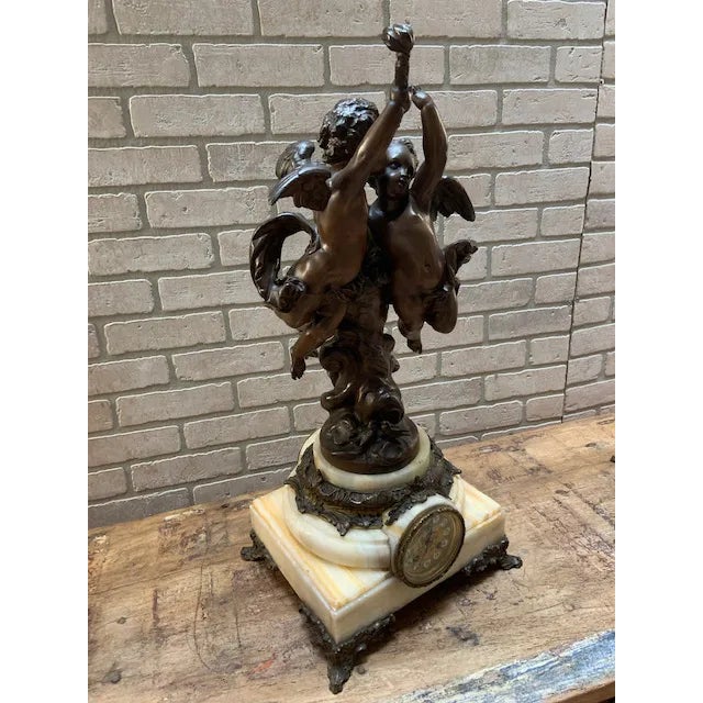 Signed Antique French Bronze Garniture Clock Set by Albert-Ernest Carrier-Belleuse Signed antique French three-piece...