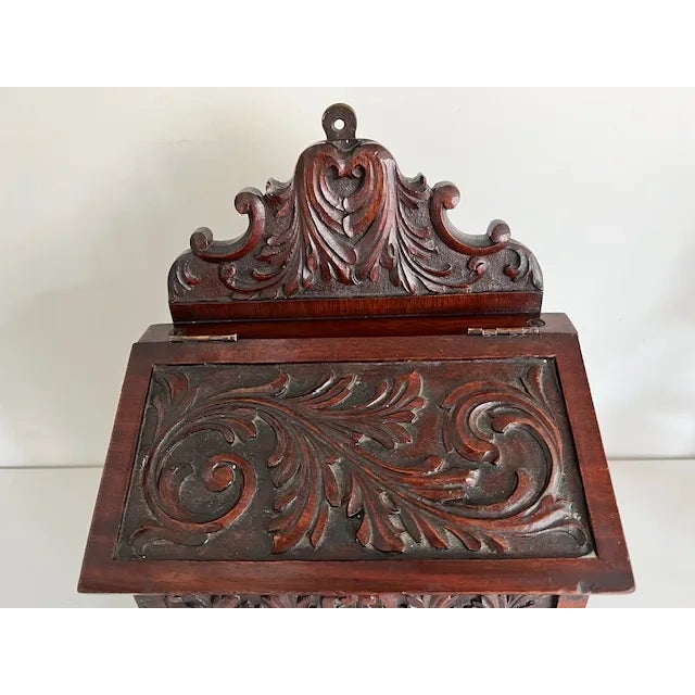 Very attractive and versatile antique carved box. The lid is 10" x 5". The opening is 4" x 8". Option to hang.