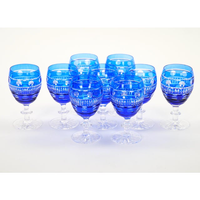 An elegant service of nine mid-century modern Val Saint Lambert crystal wine or water glasses, made in Belgium during the...