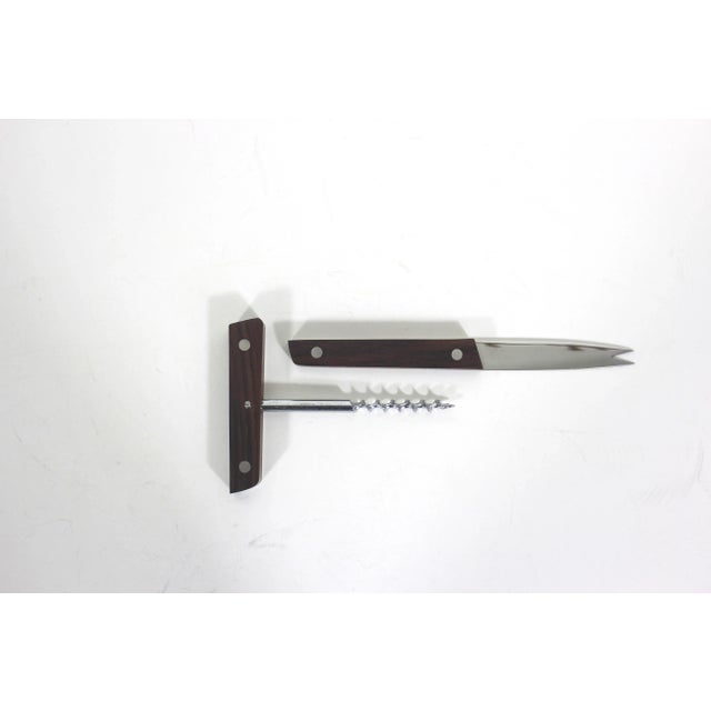 What a great gift for the corkscrew collector in your life. This is a two piece corkscrew and cheese knife set. Danish...