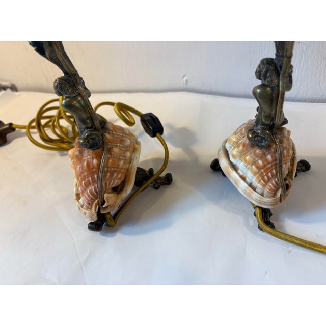 Love these exquisite shell lamps with a bronze figural base on a sea shell! Stunning!