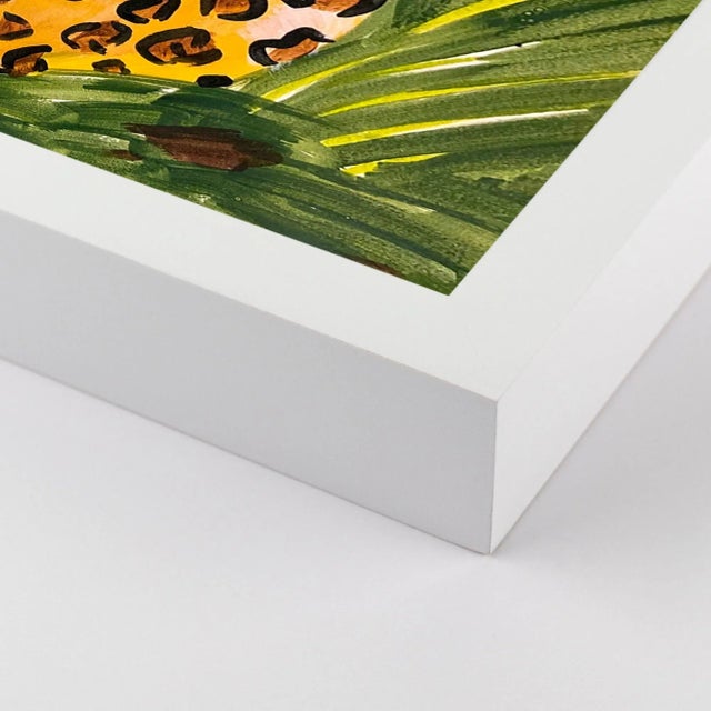 DESCRIPTION: Licking Leopard by Jelly Chen in White Framed Paper, Small Art Print SPECIFICATIONS: Type: Framed Paper....