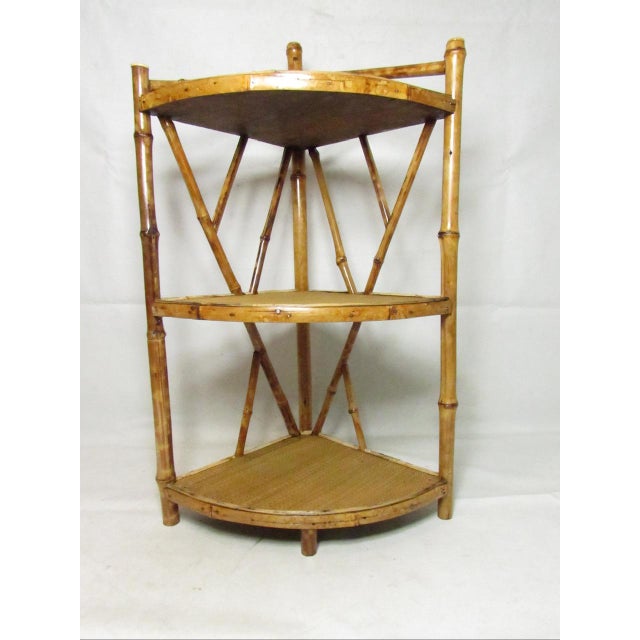 Antique English Tiger bamboo corner shelf or stand, c.1900 A good looking bamboo corner stand having three shelves. There...