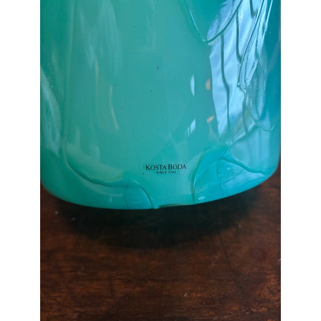 Aqua blue glass vase by Kosta Boda.