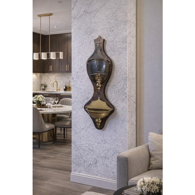 A splendid and elegant antique wall-mounted washbasin (ewer), presumably dating back to the first half of the 20th...
