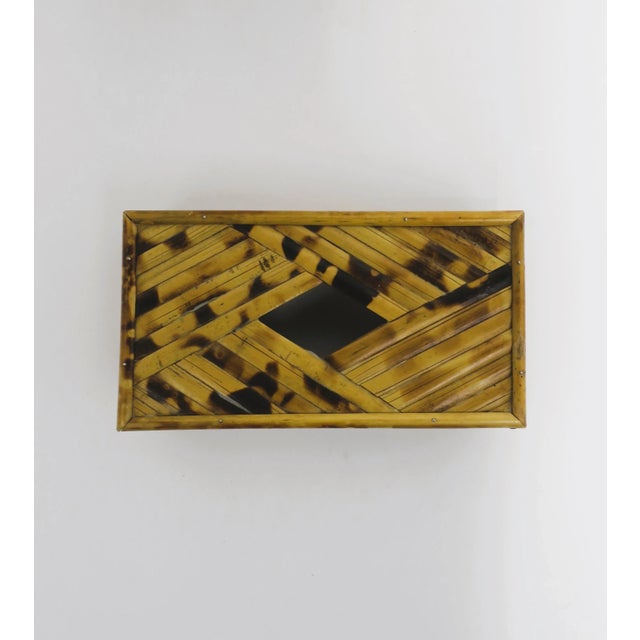 A bamboo tissue box cover, circa 1970s. Box is all bamboo with a beautiful marque opening on top. Dimensions: 5.5" D x...