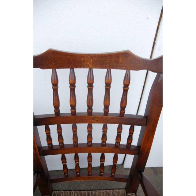 Set of 8 English oak spindle back chairs consisting of two arm chairs and six side chairs. They are the ultimate dining...