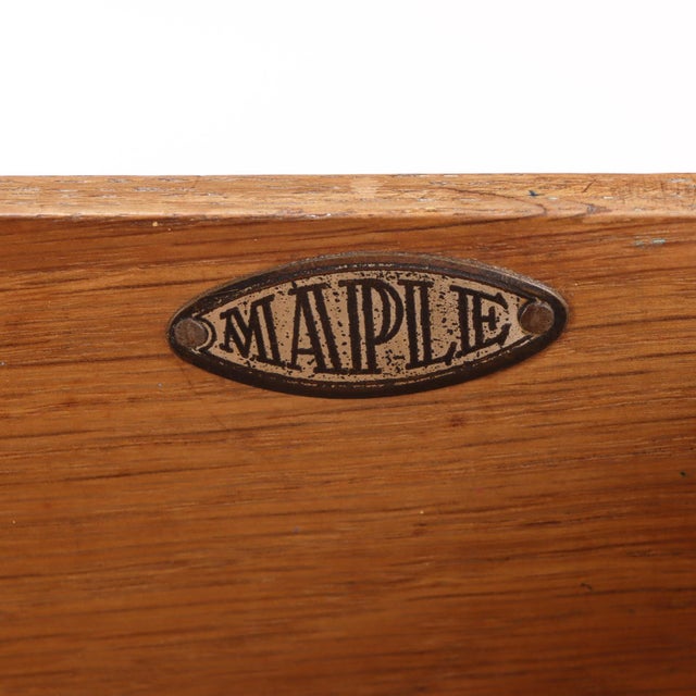 A refined example of English Art Deco design, this compact cerused oak desk by Maple & Co., circa 1940, showcases...