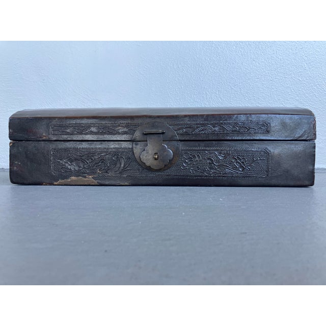 This is a very nice Antique Chinese Leather Document Case. It is likely from the late 19th century. Features leather...