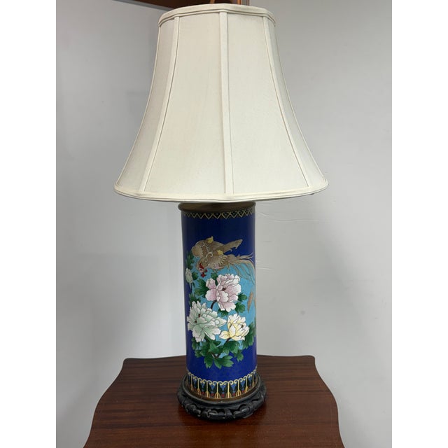 Design Plus Gallery presents a Vintage Chinese Cloisonné Style Table Lamp. The tall cylindrical body displays a phoenix...