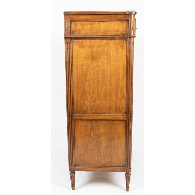 This French Louis XVI style Secrétaire à Abattant (fall-front secretary desk) features a highly structured, symmetrical...