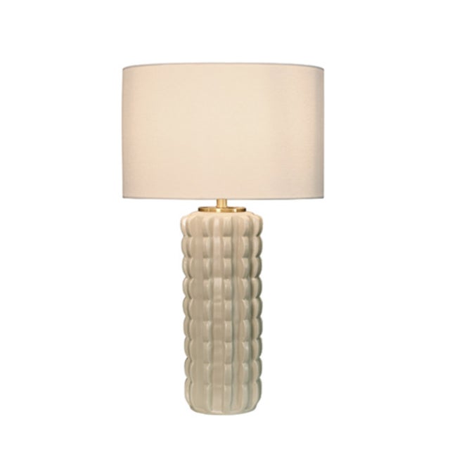 New special order item. Not vintage. Add a charming touch to your space with CeCe Beige Glazed Scalloped Ceramic Table...