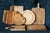 A very unique wood cutting board or cheese plate shaped like a heart with a hole for hanging. Unsure of origin. Great but...