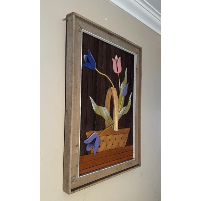 This lathe-art wall panel is applied wood-piece collage construction on slatted wood background, natural and painted...