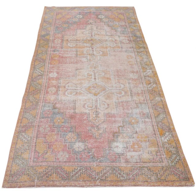 Hand-knotted with care using traditional rug-making techniques, this wool rug blends timeless craftsmanship with a modern...