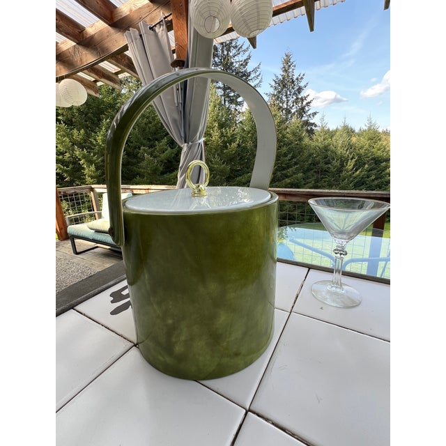 This 1970's lime green vinyl ice bucket with white lid, gold pull handle and white interior is ready to go for your next...