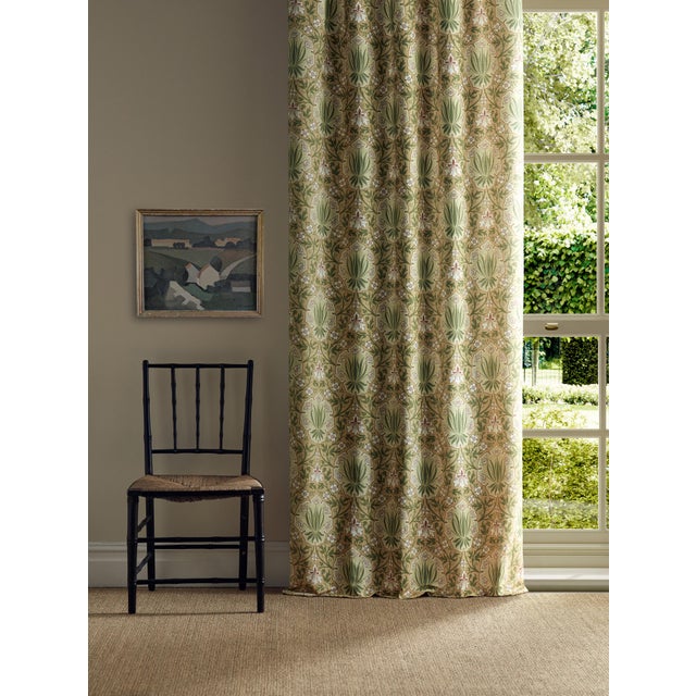 Retaining the striking shield motif of the original document Iris & Rose celebrates both flowers in a richly ornamental...