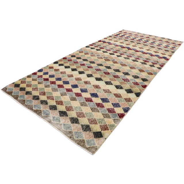 , distressed vintage Turkish Sivas rug with rustic Mid-Century Modern style. This hand knotted wool distressed vintage...