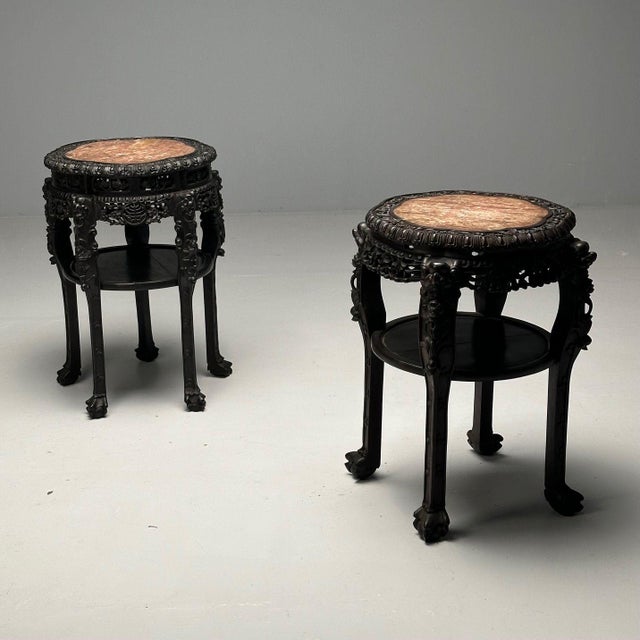 Chinese Heavily Carved, Occasional Tables, End Tables Teak, Marble, 1920s Compatible pair of heavily carved large...