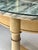 A classic late 20th-century Directoire revival round guéridon or accent side table. This stately piece features a premium,...