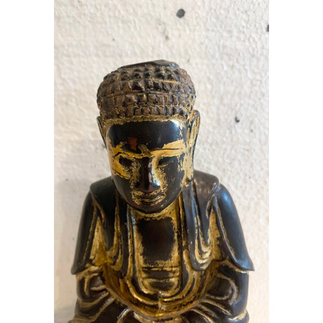 Seated Buddha in a meditative position Solid wood sculpture with a golden patina Used condition, see photos Dimensions: H...