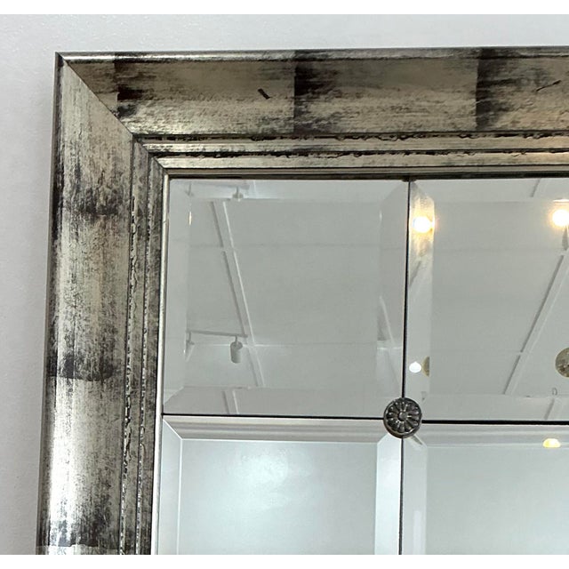 Make a commanding architectural statement with this monumental silver leaf floor mirror. This extra-large piece features a...