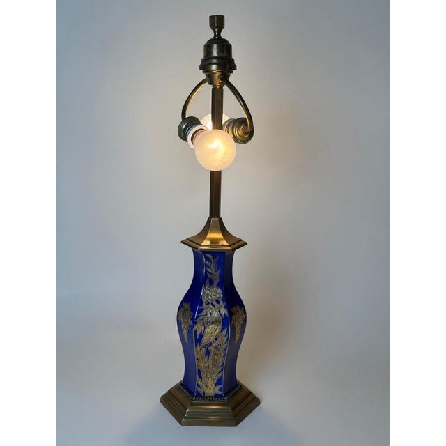 An exceptional and rare artist-signed rosenthal porcelain and brass table lamp, created in germany circa the 1920s,...