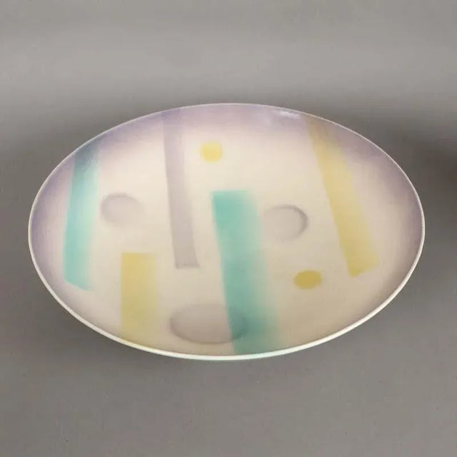 This bowl retains its original company label on the bottom.